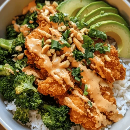 Are you ready to take your taste buds on an exciting journey? The Bang Bang Chicken Bowl is not just a meal; it's an experience bursting with vibrant flavors and textures. Originating from Asian cuisine, this dish has rapidly gained popularity for its perfect balance of spice, sweetness, and crunch. Diced, crispy chicken thighs are paired with fluffy jasmine rice, vibrant vegetables, and a creamy, spicy sauce that ties everything together. It’s a dish that not only satisfies your hunger but also delights your senses.